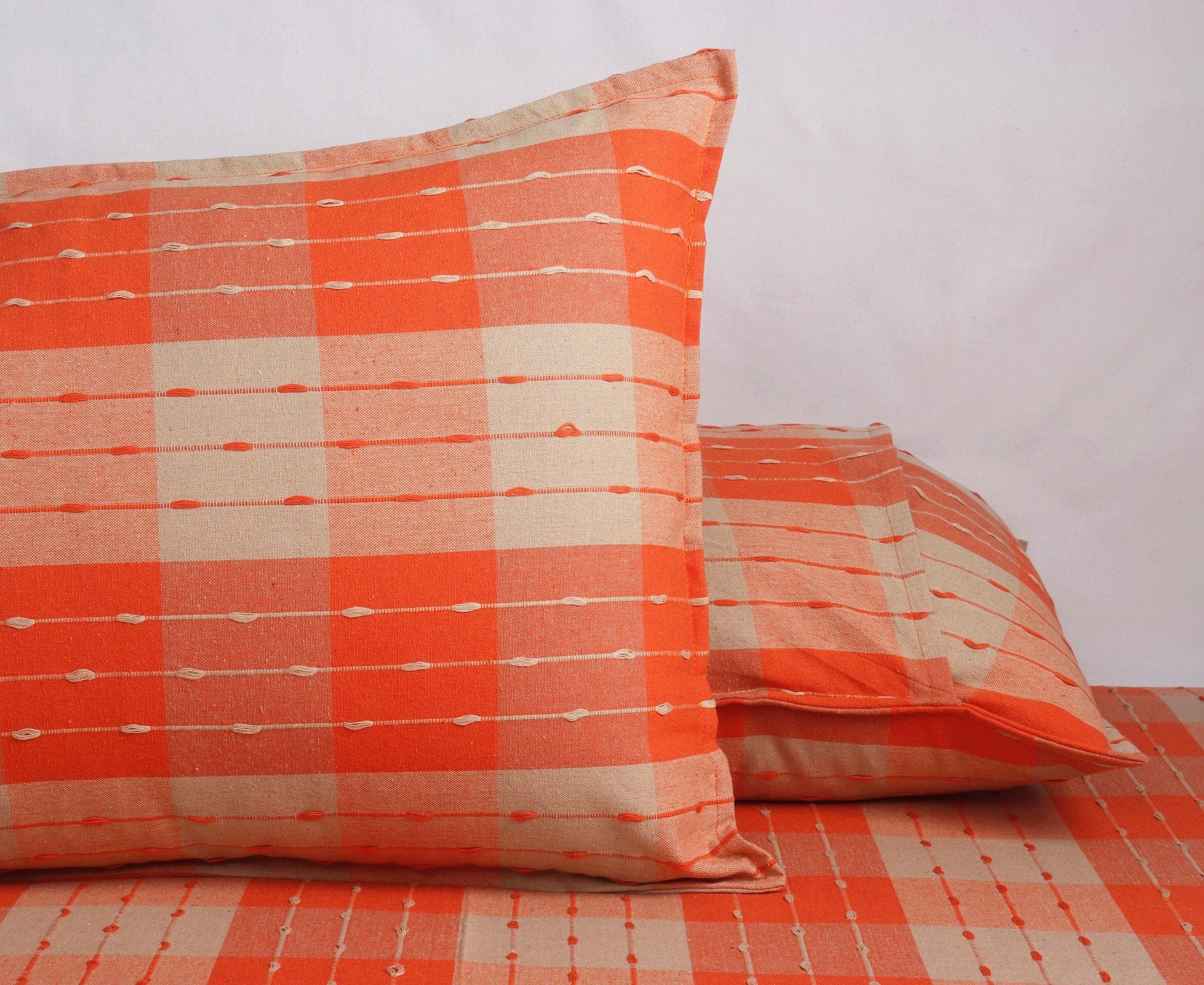 Cotton Designer Dobby Checkered Bedsheet with Pillow Covers (Orange, Beige)